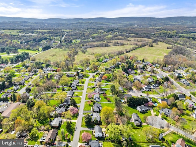 birds eye view of property featuring a residential view and a mountain view