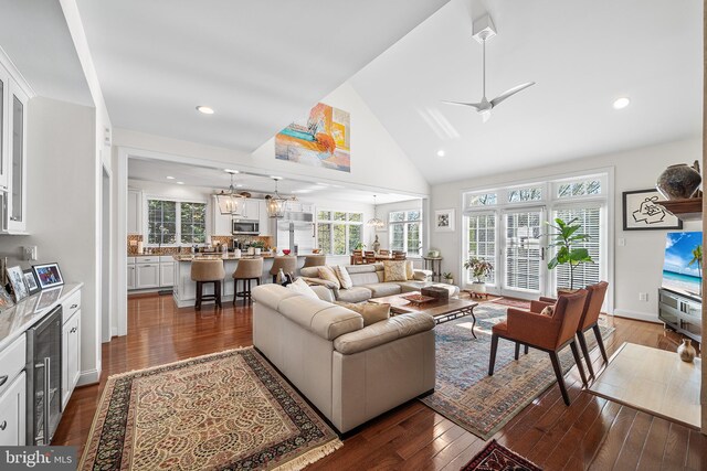 1430 County Line Rd, Bryn Mawr, PA 19010 - living area featuring dark wood-type flooring, high vaulted ceiling, a ceiling fan, and wine cooler