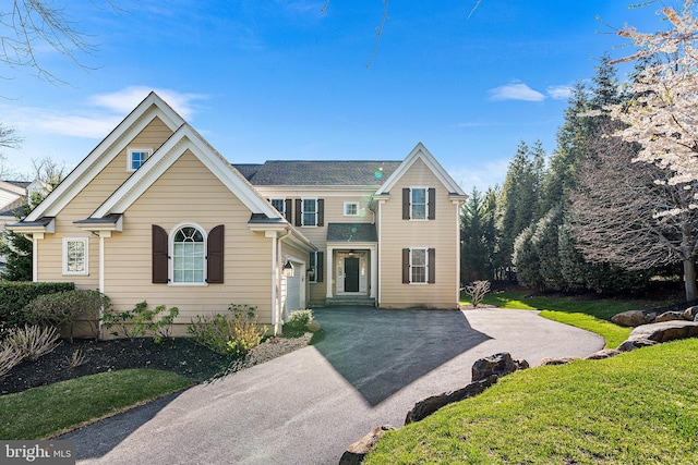1430 County Line Rd, Bryn Mawr, PA 19010 - view of front facade featuring a garage and aphalt driveway