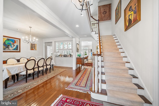 1430 County Line Rd, Bryn Mawr, PA 19010 - foyer featuring an inviting chandelier, crown molding, recessed lighting, wood finished floors, and stairs