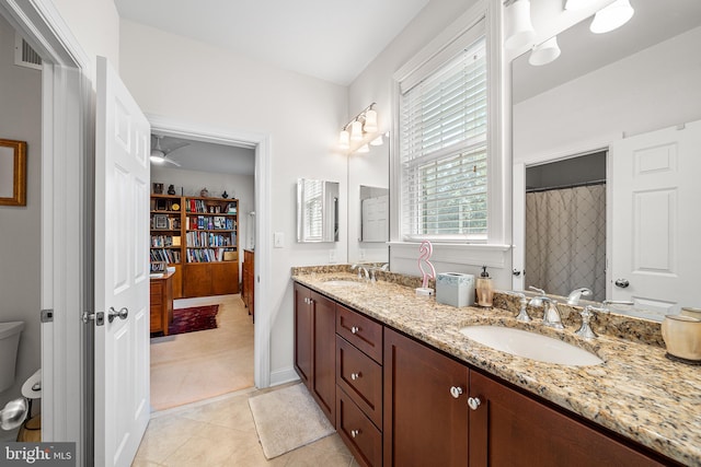 1430 County Line Rd, Bryn Mawr, PA 19010 - full bathroom with tile patterned floors, double vanity, a sink, and toilet