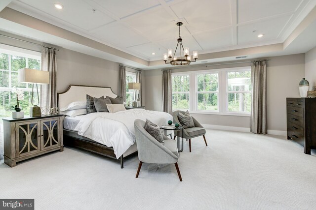 carpeted bedroom featuring coffered ceiling, a notable chandelier, and multiple windows