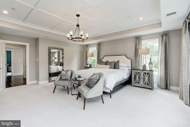 bedroom with coffered ceiling, a chandelier, carpet flooring, and visible vents