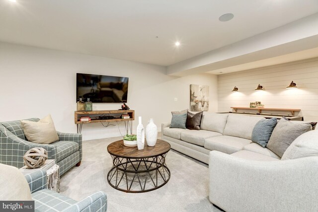 carpeted living room featuring recessed lighting