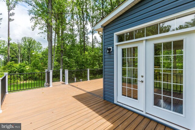 wooden deck with french doors