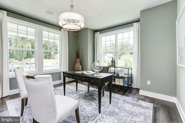 office area featuring dark wood-style flooring, baseboards, and plenty of natural light