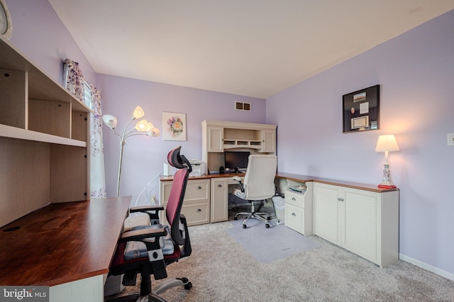 carpeted home office featuring visible vents