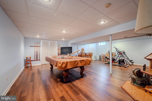 rec room featuring baseboards, a paneled ceiling, wood finished floors, and billiards