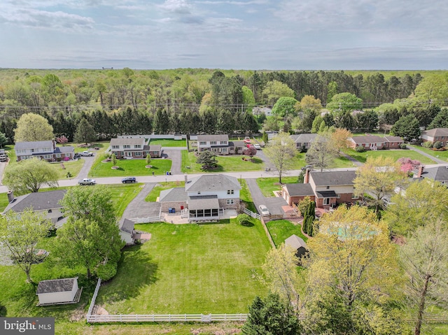 bird's eye view with a residential view and a view of trees