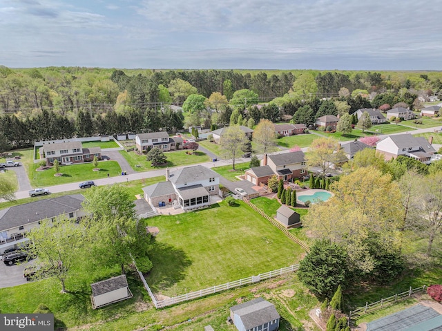 aerial view with a residential view and a forest view