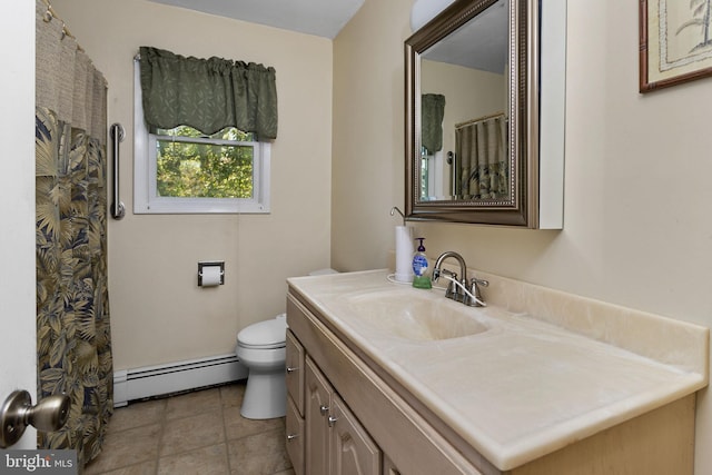bathroom featuring vanity, tile patterned floors, baseboard heating, and toilet
