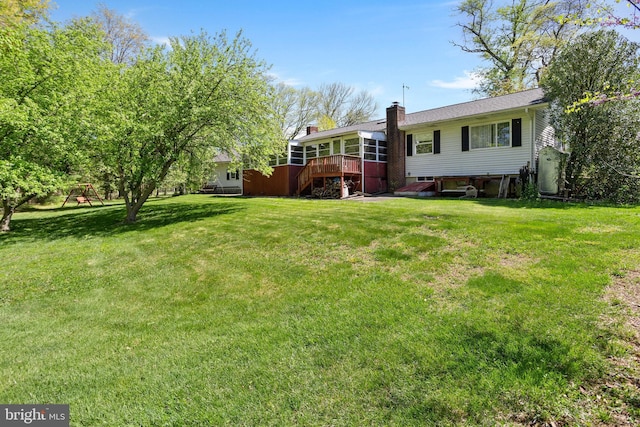 view of yard featuring a wooden deck