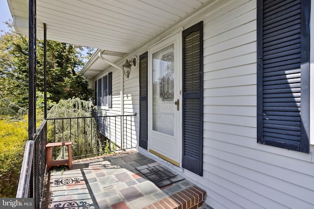 entrance to property with a porch