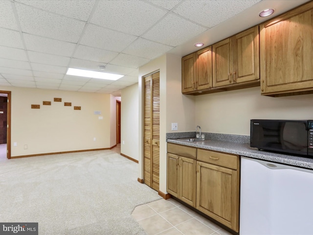 11035 Bennie Duncan Rd, Frederick, MD 21701 - kitchen featuring black microwave, dishwasher, a sink, a drop ceiling, and light colored carpet