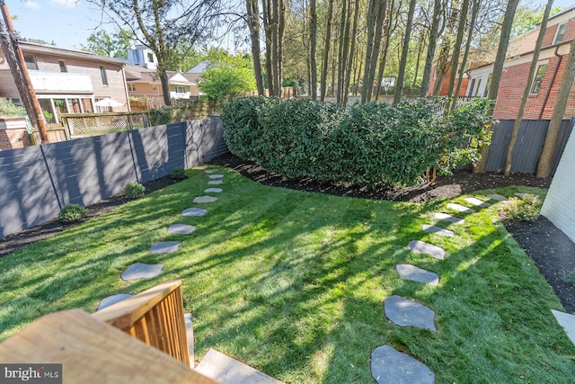view of yard featuring fence