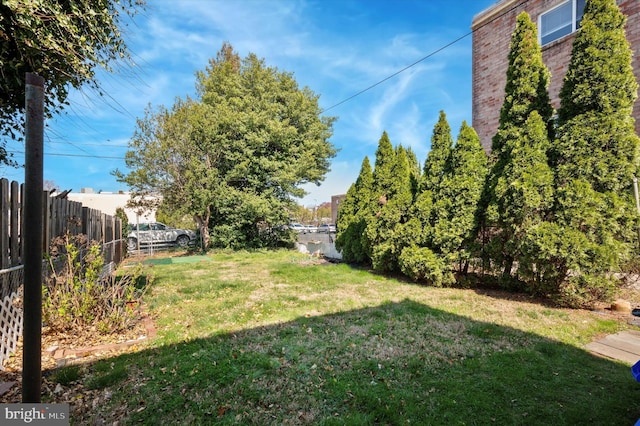 view of yard with fence