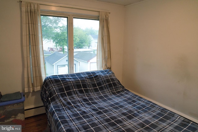 20 Leuckel Ave, Hamilton, NJ 08619 - bedroom featuring multiple windows, ornamental molding, and a baseboard heating unit