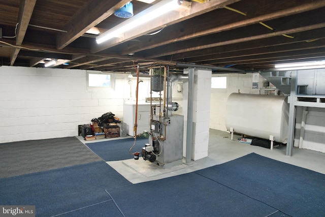 20 Leuckel Ave, Hamilton, NJ 08619 - below grade area with heating fuel, a heating unit, washer / dryer, and plenty of natural light