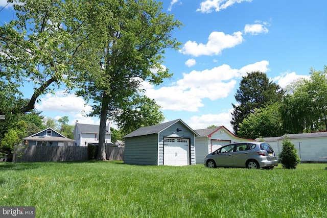 20 Leuckel Ave, Hamilton, NJ 08619 - view of yard featuring an outbuilding and a garage