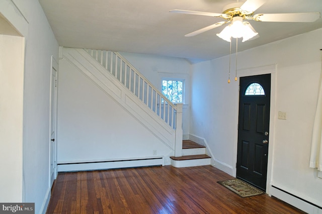 20 Leuckel Ave, Hamilton, NJ 08619 - foyer entrance featuring a baseboard heating unit, baseboard heating, stairs, wood finished floors, and healthy amount of natural light