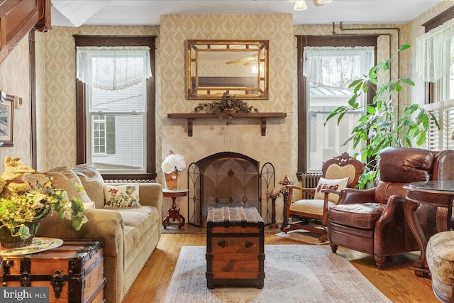 6626 Jefferson Blvd, Frederick, MD 21703 - living area featuring a healthy amount of sunlight, light wood-style floors, and wallpapered walls
