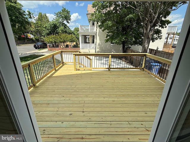 wooden deck featuring fence