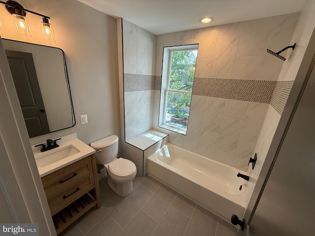 bathroom with tile patterned flooring, toilet, vanity, washtub / shower combination, and recessed lighting