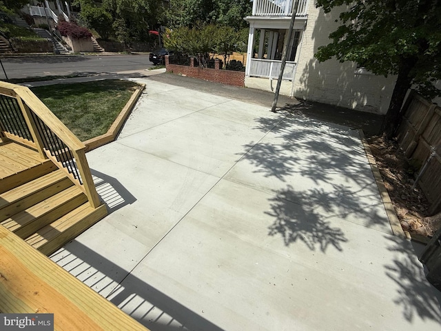 view of patio featuring fence