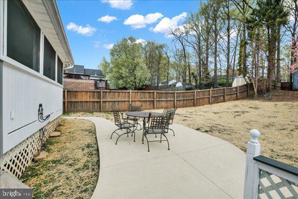 6135 Rainbow Dr, Elkridge, MD 21075 - view of patio / terrace with a fenced backyard