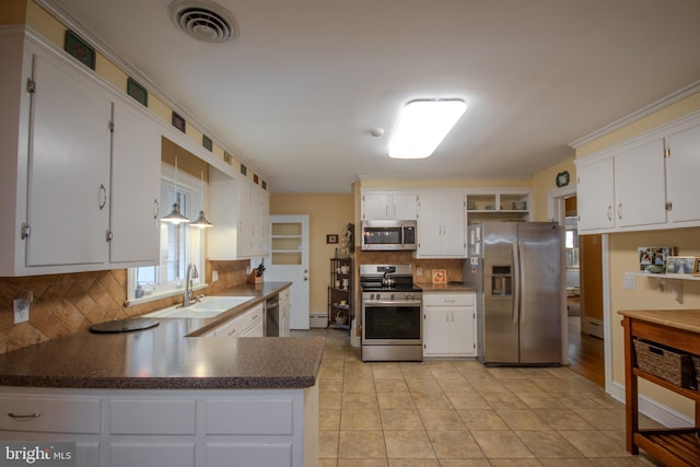 kitchen with visible vents, open shelves, decorative backsplash, a sink, and appliances with stainless steel finishes