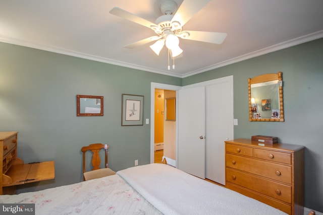 bedroom featuring crown molding, a baseboard radiator, and a ceiling fan