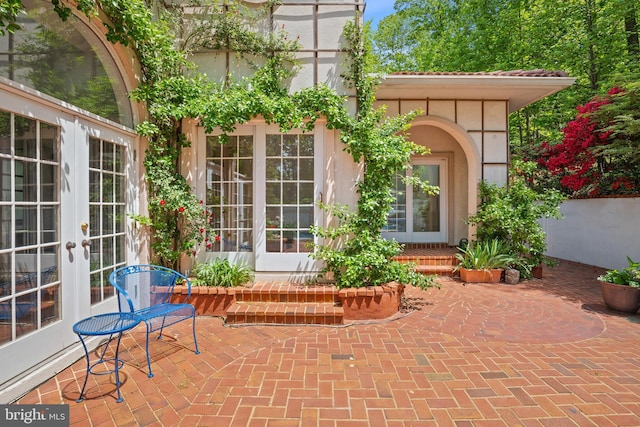 1405 N Pegram St, Alexandria, VA 22304 - exterior space featuring french doors, a patio, and stucco siding