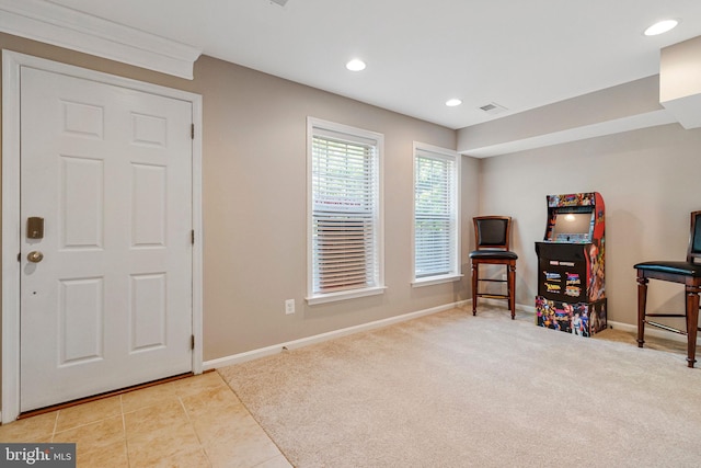 interior space with recessed lighting, baseboards, visible vents, and tile patterned floors
