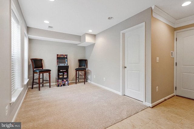 living area with recessed lighting, baseboards, visible vents, and carpet