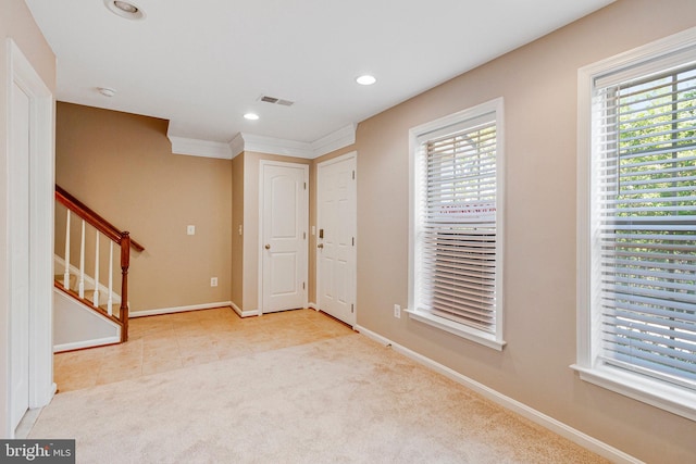 carpeted entryway with stairs, recessed lighting, baseboards, and visible vents
