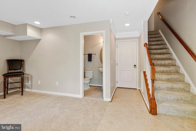 interior space with recessed lighting, baseboards, carpet, and tile patterned flooring