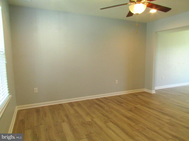 107 Bobbys Branch Rd Unit 4, Millsboro, DE 19966 - empty room featuring wood finished floors, ceiling fan, and baseboards
