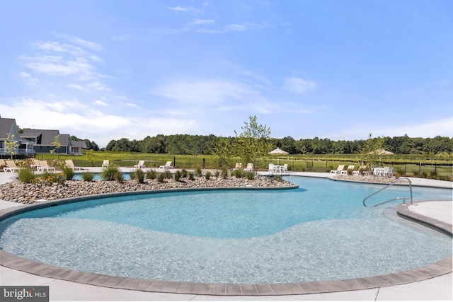community pool with fence