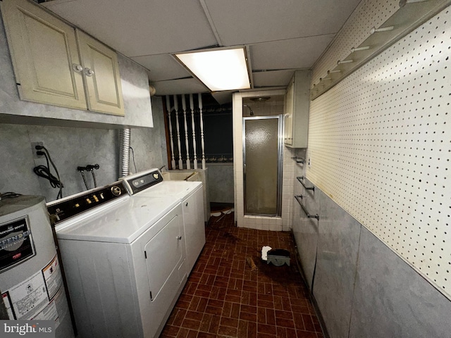 104 Amherst Ave, Reading, PA 19609 - laundry room with water heater, independent washer and dryer, cabinet space, and brick patterned floors