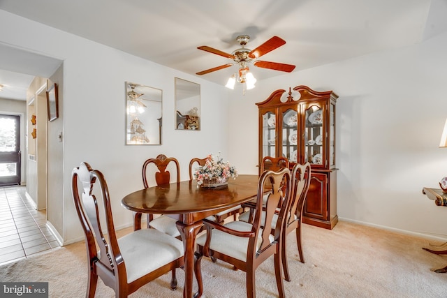9 Dennison Dr, East Windsor, NJ 08520 - dining space with light carpet, a ceiling fan, and baseboards