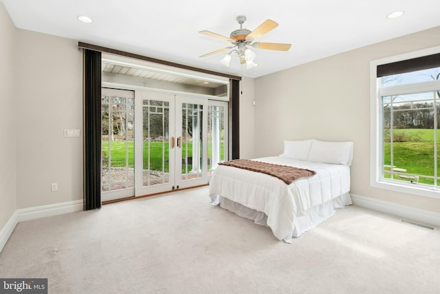 unfurnished bedroom featuring french doors, carpet floors, access to exterior, and baseboards