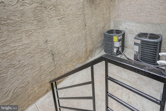 1143 Tasker St, Philadelphia, PA 19148 - details featuring cooling unit and stucco siding