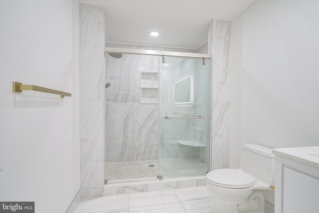 1143 Tasker St, Philadelphia, PA 19148 - full bathroom featuring a marble finish shower, marble finish floor, vanity, and toilet