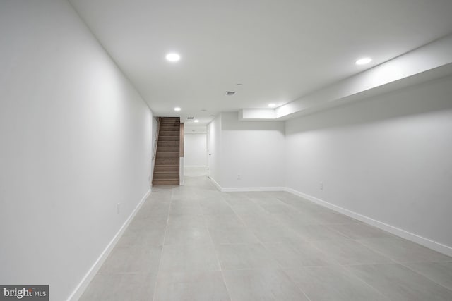 1143 Tasker St, Philadelphia, PA 19148 - finished below grade area with baseboards, stairs, and recessed lighting
