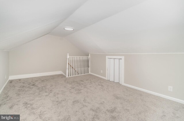 606 N St, Lykens, PA 17048 - additional living space with vaulted ceiling, baseboards, and carpet