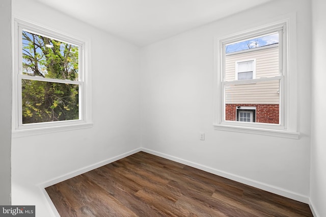 4319 Valley View Ave, Baltimore, MD 21206 - spare room featuring dark wood finished floors and baseboards