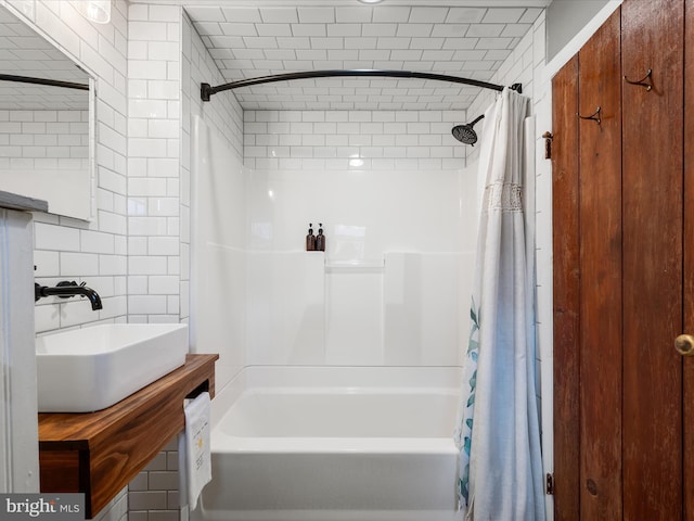 full bathroom with vanity and shower / bath combo with shower curtain