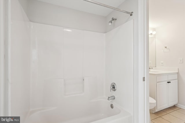 full bath with vanity, toilet, tile patterned flooring, and shower / tub combination