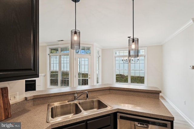kitchen with wood finished floors, stainless steel dishwasher, a sink, crown molding, and pendant lighting