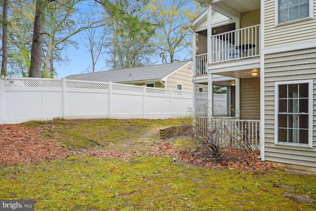 view of yard with a fenced backyard